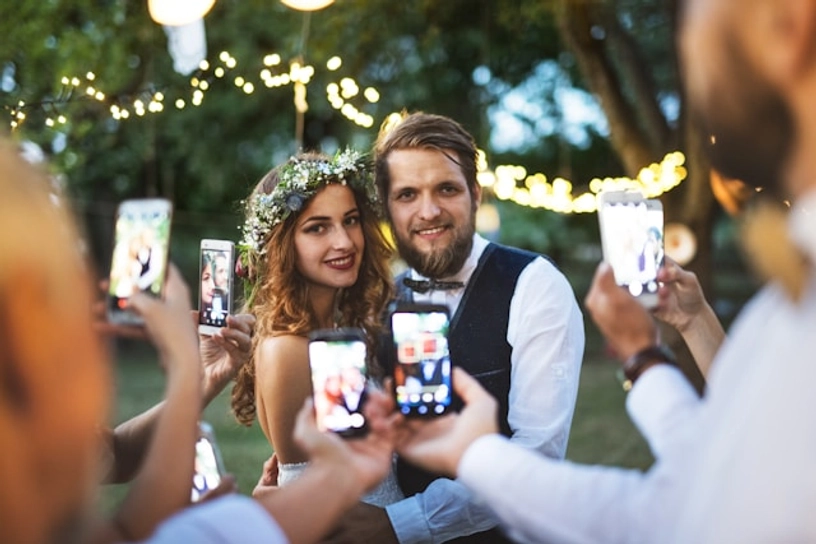 wedding couple getting their picture taken